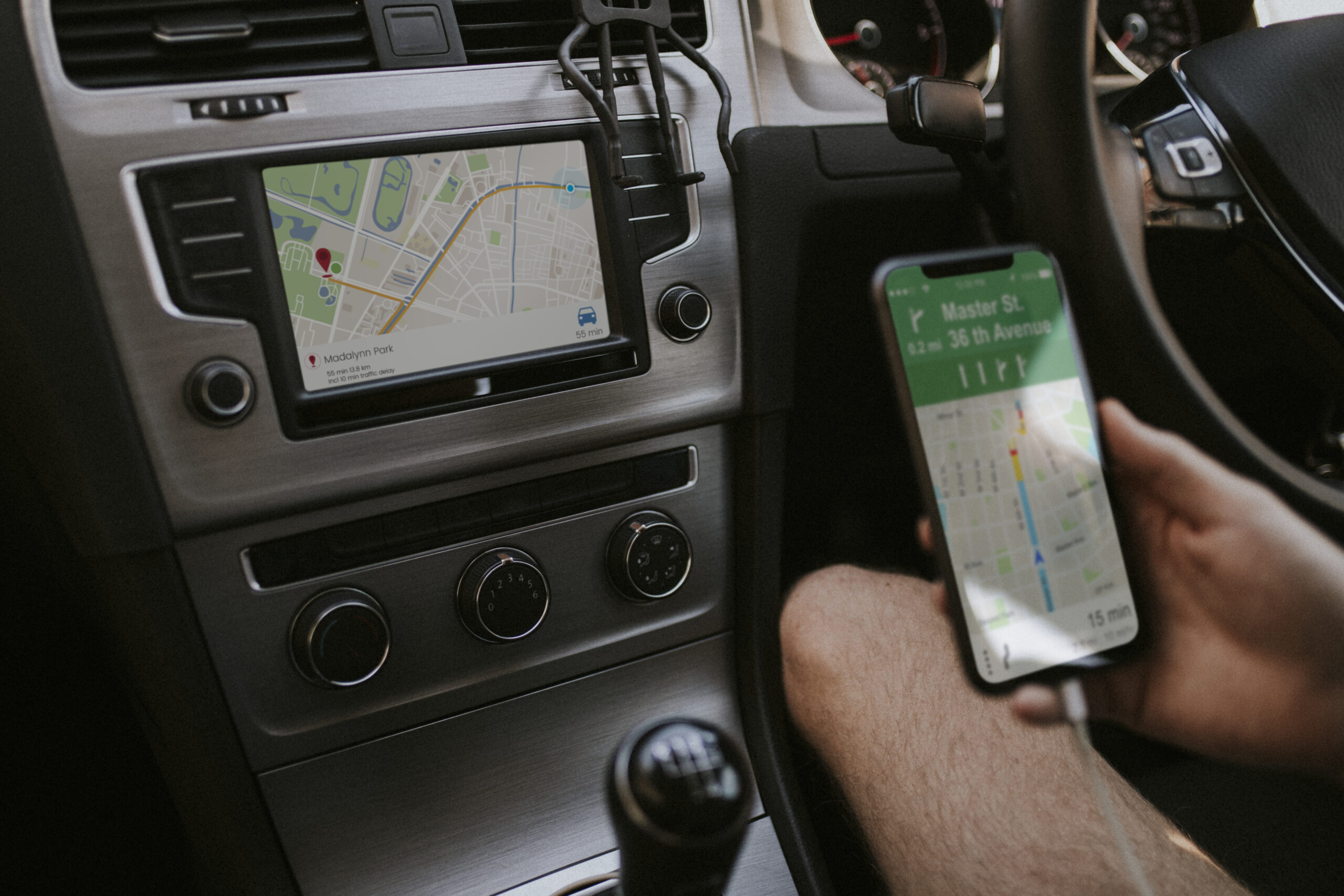 Driver using mobile phone for navigation